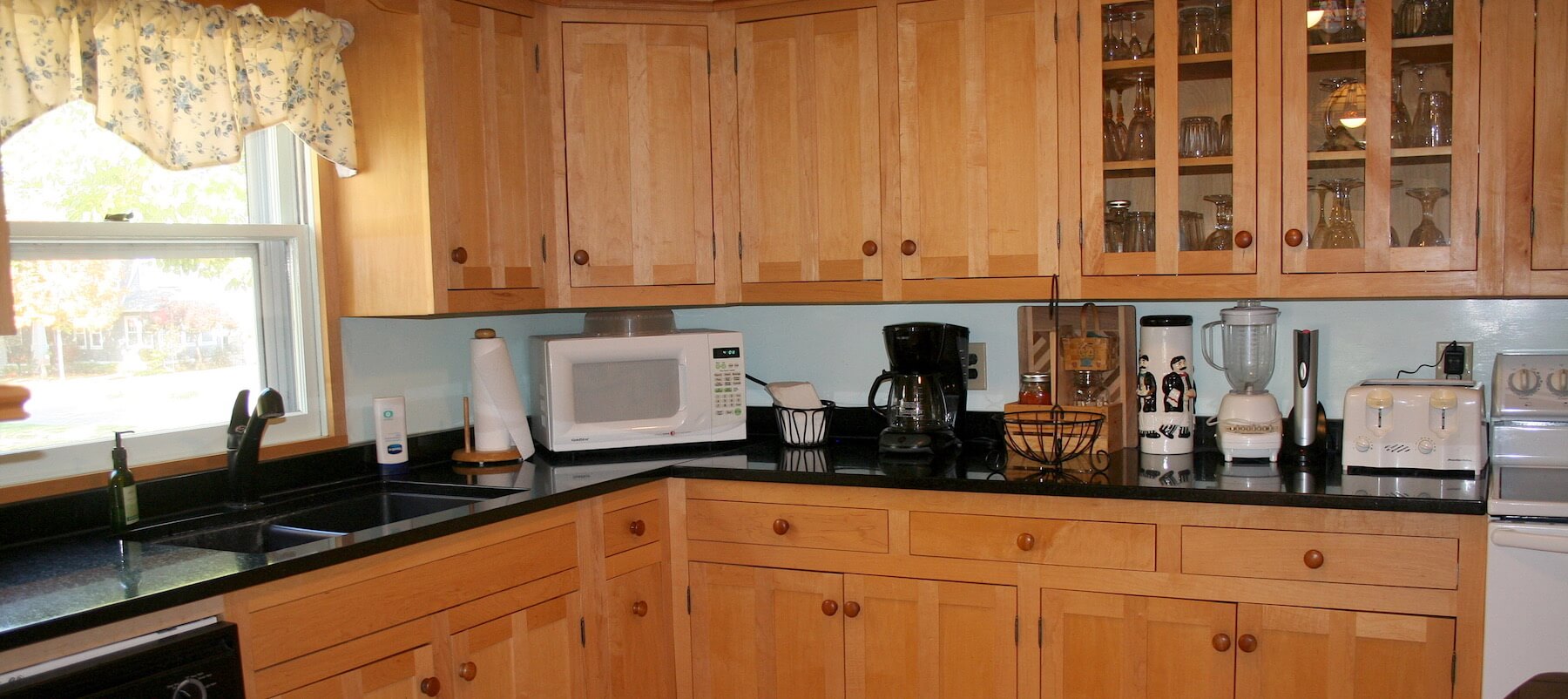 Full view of a custom kitchen with built-in cabinetry